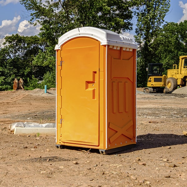 what is the cost difference between standard and deluxe portable toilet rentals in Copenhagen NY